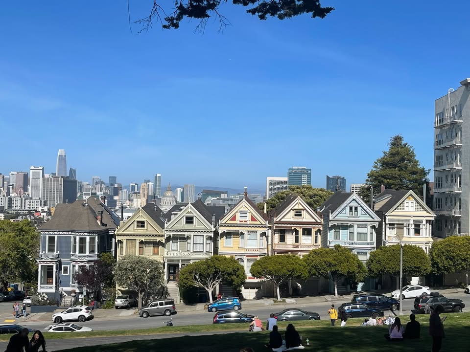 Painted Ladies Victorian houses with SF skyline